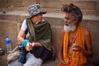 Western woman and Indian sadhu in conversation.