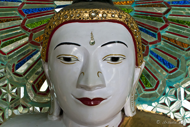 Close-up: white porcelain Buddha head, U Min Thonze Cave, Mandalay, Myanmar