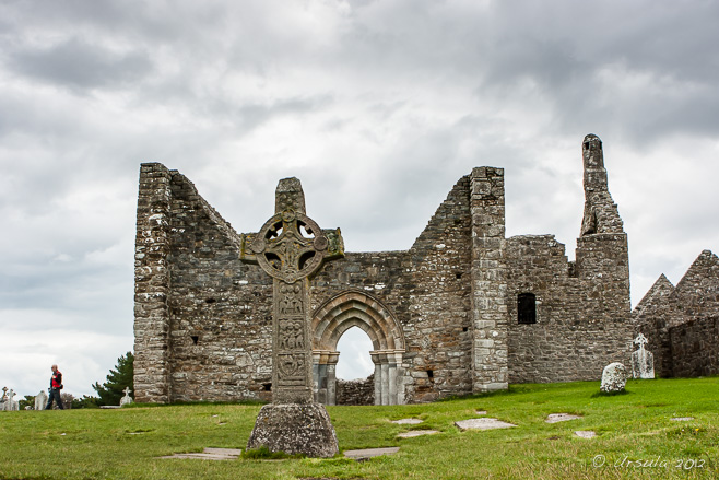 West face of the High Cross of the Scriptures and the Cathedral at Clonmacnoise, Co. Offaly