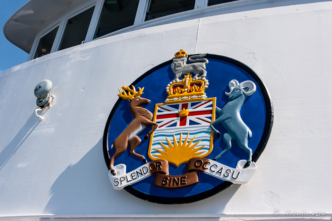 British Columbia provincial crest on the prow of a ferry.