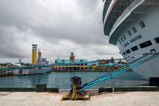 Carnival Sensation cruise boat tied up at dock, Prince George Wharf