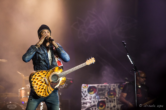 Michael Franti on stage at Byron Bay Bluesfest 2014.