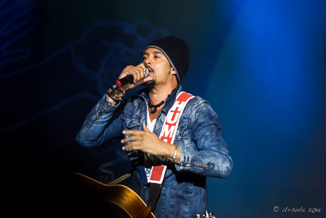 Michael Franti on stage at Byron Bay Bluesfest 2014.