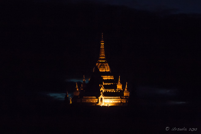 Ananda Temple is flood-lit against the night sky, Bagan Myanmar