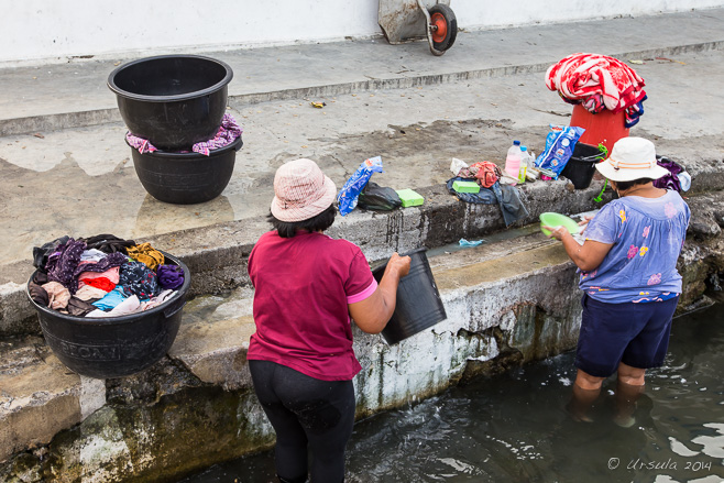 Women doing Laundry, Tiga Raja harbour,  North Sumatra