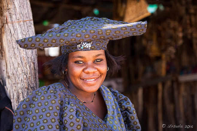 Portrait of a smiling Herero Woman in Blue, Damaraland, Namibia