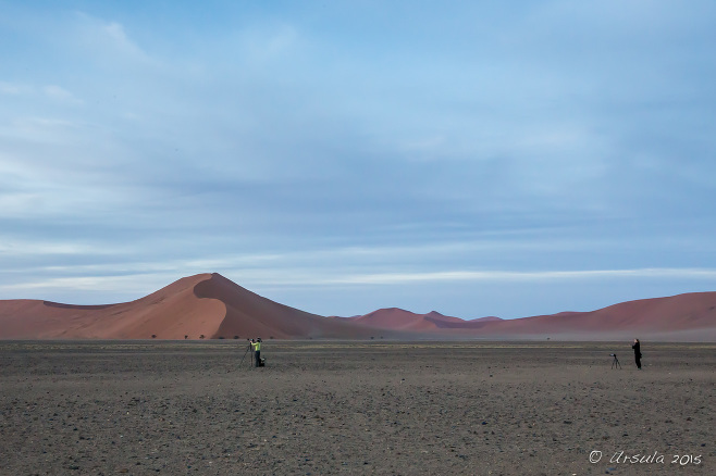 Photographers on the flat ground in front of Dune 40, Namib-Naukluft Park, Namibia