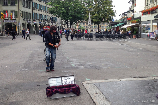 Busker on bagpipes in Bern, Switzerland