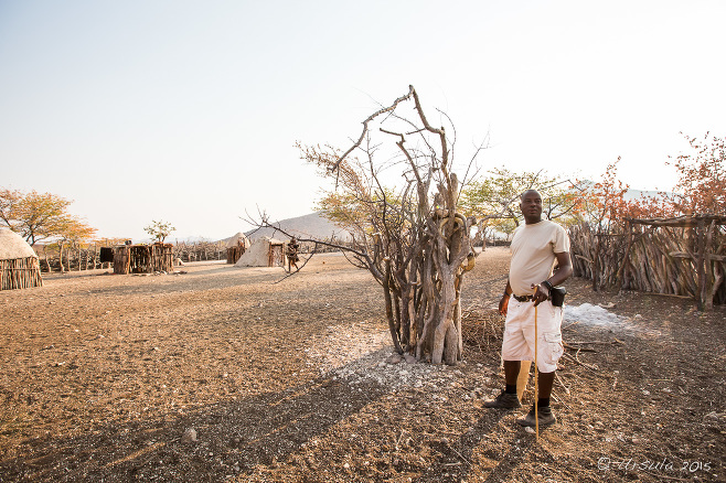 Smiling Himba man in a kraal, Kunene Namibia