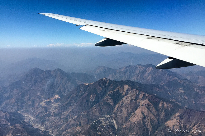 Airplane wing over the Kathmandu Valley, Nepal