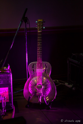 Steel Guitar in purple light, Cascades Restaurant, Thredbo Village, Australia