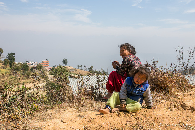 Nepali woman and child on a hill, Namobuddha to Dhulikhel, Kathmandu Valley
