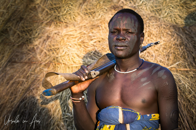 Mursi man with gun, Ethiopia