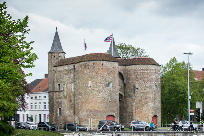 Gentpoort from a bus window, Bruges Belgium.