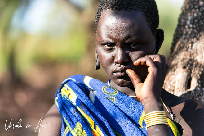 Portrait of a Young Mursi Woman with Short Hair and Attitude, Ethiopia