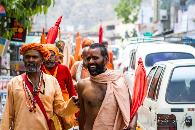 Pilgrims and cars on the road into Haridwar, India