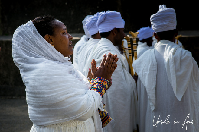 Woman in a white headscarf praying, Entoto Maryam Church, Ethiopia