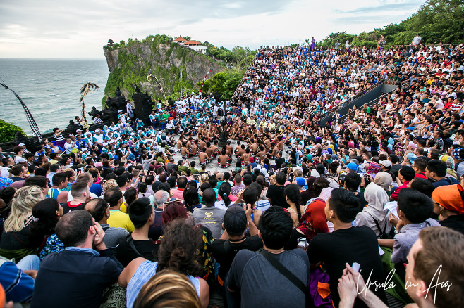 The dance area of Uluwatu Temple Bali, full of visitors and the men of the Monkey Chorus.