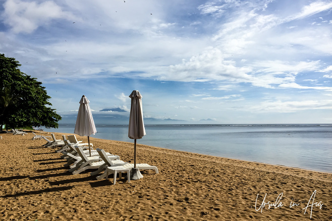 Empty deck chairs, Sanur Beach, Bali