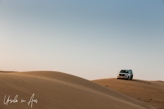 Toyota Four-Wheel Drive on the desert dunes of Wahiba Sands, Oman