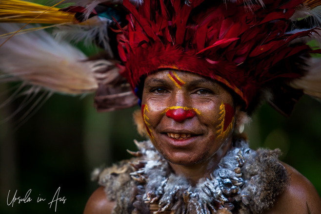 Portrait: Tribal woman from Jiwaka Province in traditional costume, Papua New Guinea