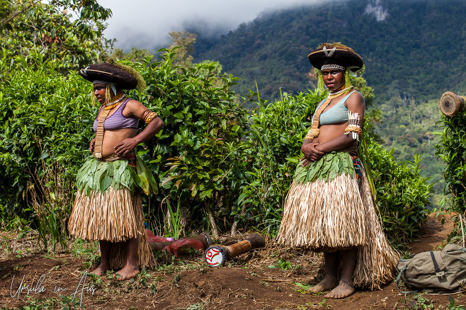 Two Enga women in traditional costume, Paiya Village, Papua New Guinea.