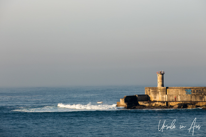 Small boat fishing off the Outer Breakwater, Leixoes, Portugal