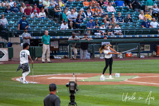 Womens PGA hitting baseballs with a golf club, Safeco, Seattle USA