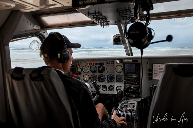 Pilot in the cockpit of a GippsAero, Fraser Island Queensland Australia