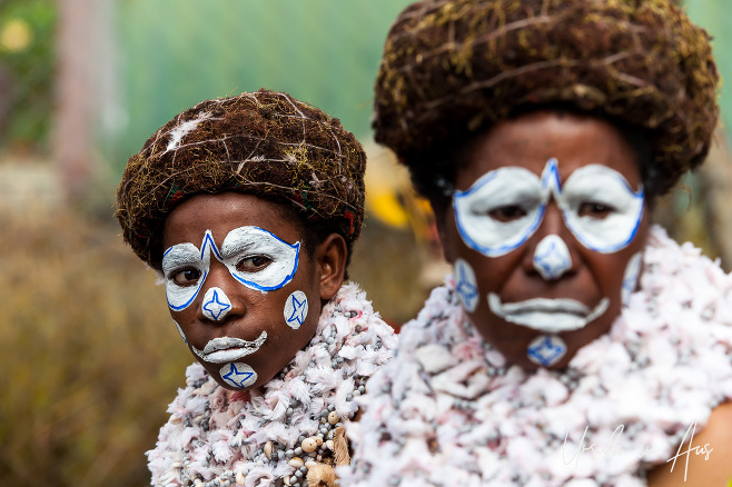 Western Highland Woman in Blue and White face paint, Mt Hagen, Papua New Guinea
