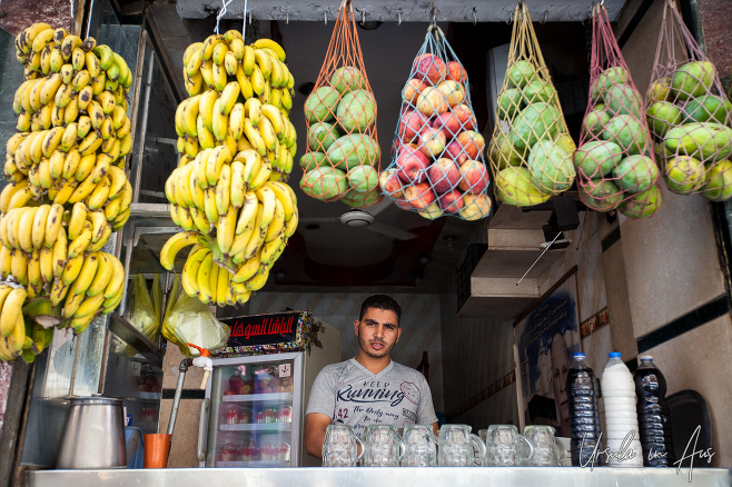 Egyptian man at a fruit drink stand, Luxor.
