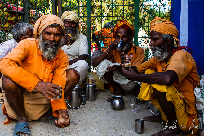 Squatting sadhus and their cups of chai, Haridwar India