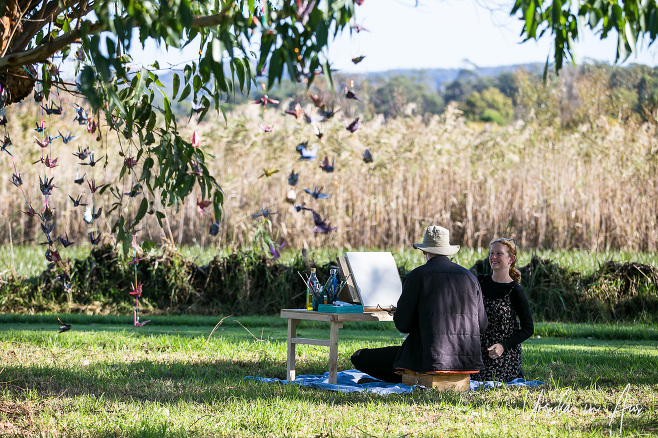 An artist and his muse in the grass, Panboola Wetlands, Pambula NSW Australia.