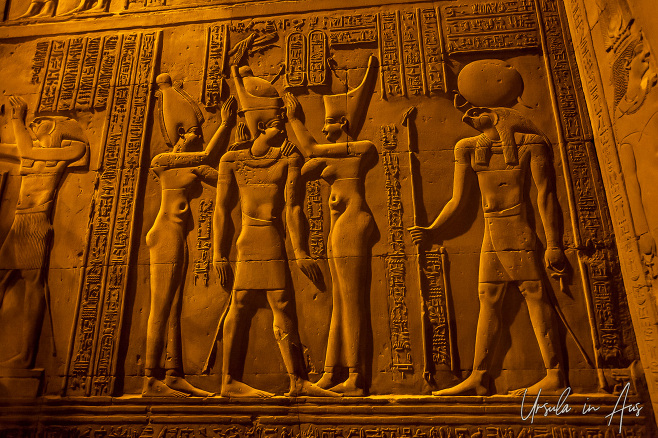 Wall relief of Haroeris, Wadjet and Nekhbet crowning Pharaoh Ptolemaios XII, Kom Ombo Temple Egypt.