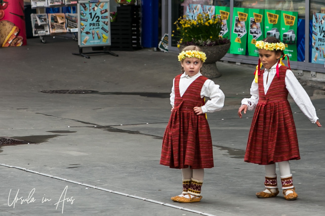 Two small blond Norwegian girls in folk costume, Bergen