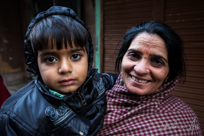 Portrait: woman and child in blankets, Haridwar India