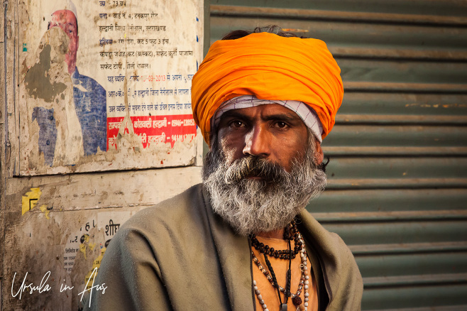 Portrait:Sadhu in an orange turban and grey beard, Haridwar India.