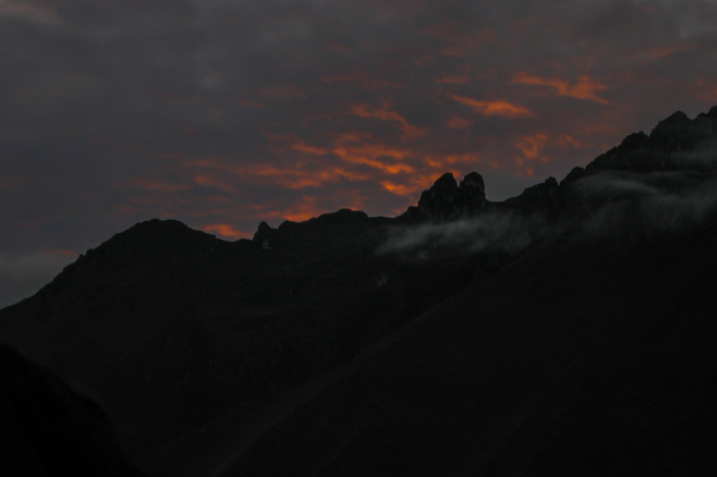 Pink pre-dawn clouds over Wayllabamba on the Inca Trail, Peru