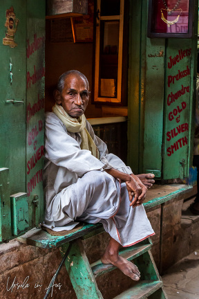 Man in a shop doorway, Varanasi, India