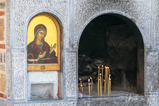 Candles on a shrine to the Virgin Mary, Monastery of Kera Kardiotissa, Lasithi Greece.