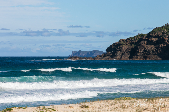 View south from Boomerang Beach to Sugarloaf Point, NSW Australia