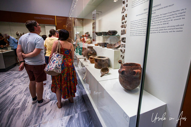 Visitors looking at exhibits, Heraklion Archaeological Museum, Crete Greece.