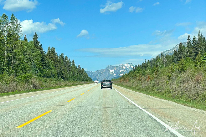 Car driving west towards Mount Robson, BC Canada