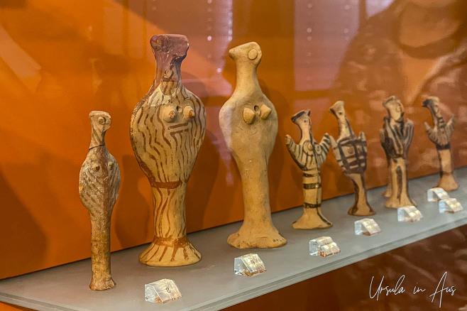 Terracotta psi figurines in a display, the Archaeological Museum of Delphi, Greece