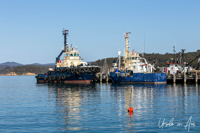 Two tugboats in Snug Cove, Eden Harbour, NSW Australia