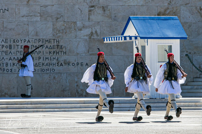 Three Greek Presidential Guards marching, Tomb of the Unknown Soldier, Athens.