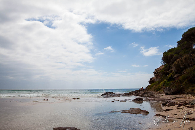 Landscape: Rocks and sand on the south end of Pambula Beach, NSW Australia