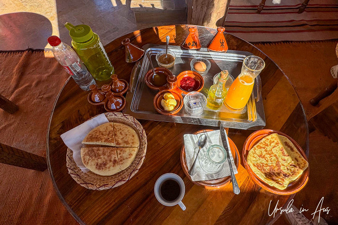 Orange juice, boiled egg, bread, pancake and mini-tagines of butter jam and honey, Kasbah du Toubkal, Imlil Morocco